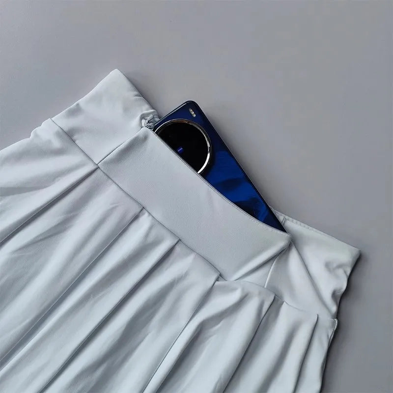 Tenue Tennis & Padel Femme – Polo Court & Jupe Short Plissée